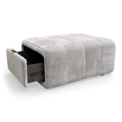 View of the storage drawer partially extended, showing the interior storage space.