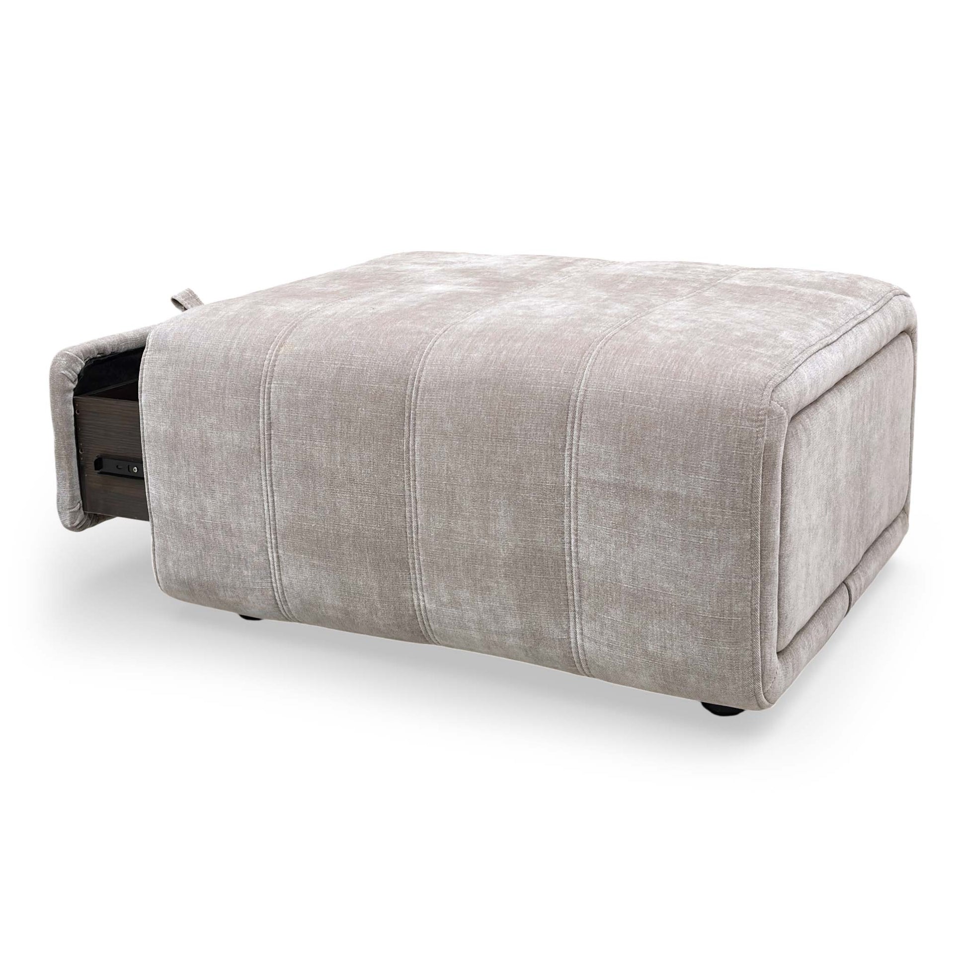 Side perspective view of the footstool, highlighting the fabric texture and stitching details.