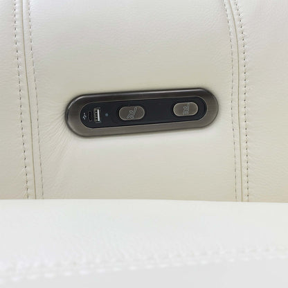View of the side control buttons for the independent power recline and footrest functions.