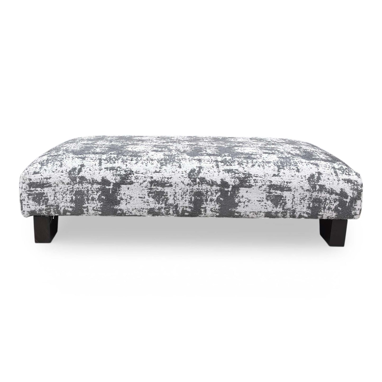 Detailed view of the sturdy wood feet, illustrating the stable base and clean finish of this handcrafted designer footstool.