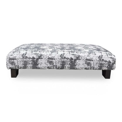Detailed view of the sturdy wood feet, illustrating the stable base and clean finish of this handcrafted designer footstool.