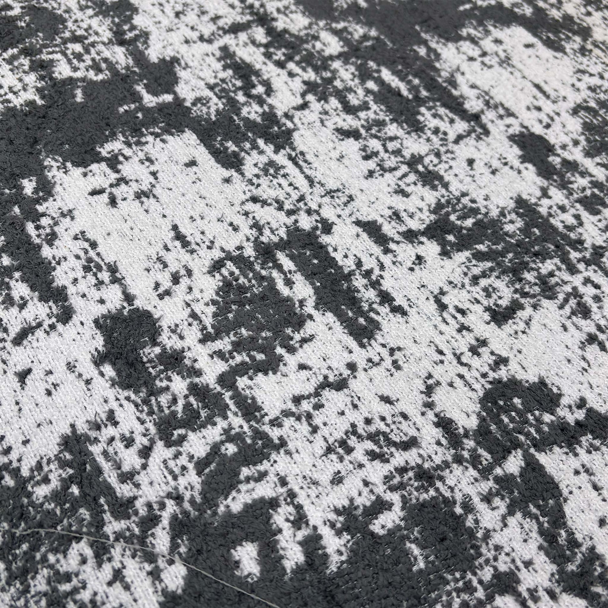 Close-up of the plush Kai Grey chenille fabric, emphasizing the soft texture and high-quality weave of the upholstery.