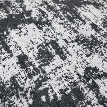 Close-up of the plush Kai Grey chenille fabric, emphasizing the soft texture and high-quality weave of the upholstery.