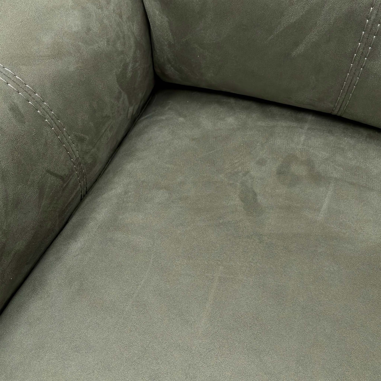 Close-up profile of the corner sofa highlighting the high-back design and plush headrest cushioning.