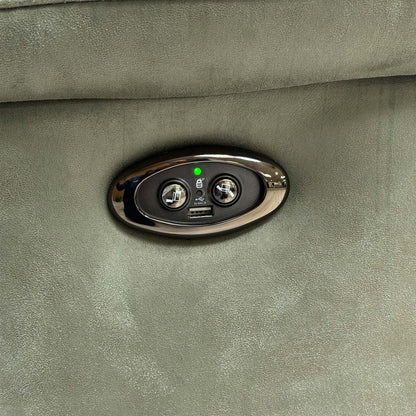Close-up of the integrated power reclining button and USB charging port on the side of the sofa.
