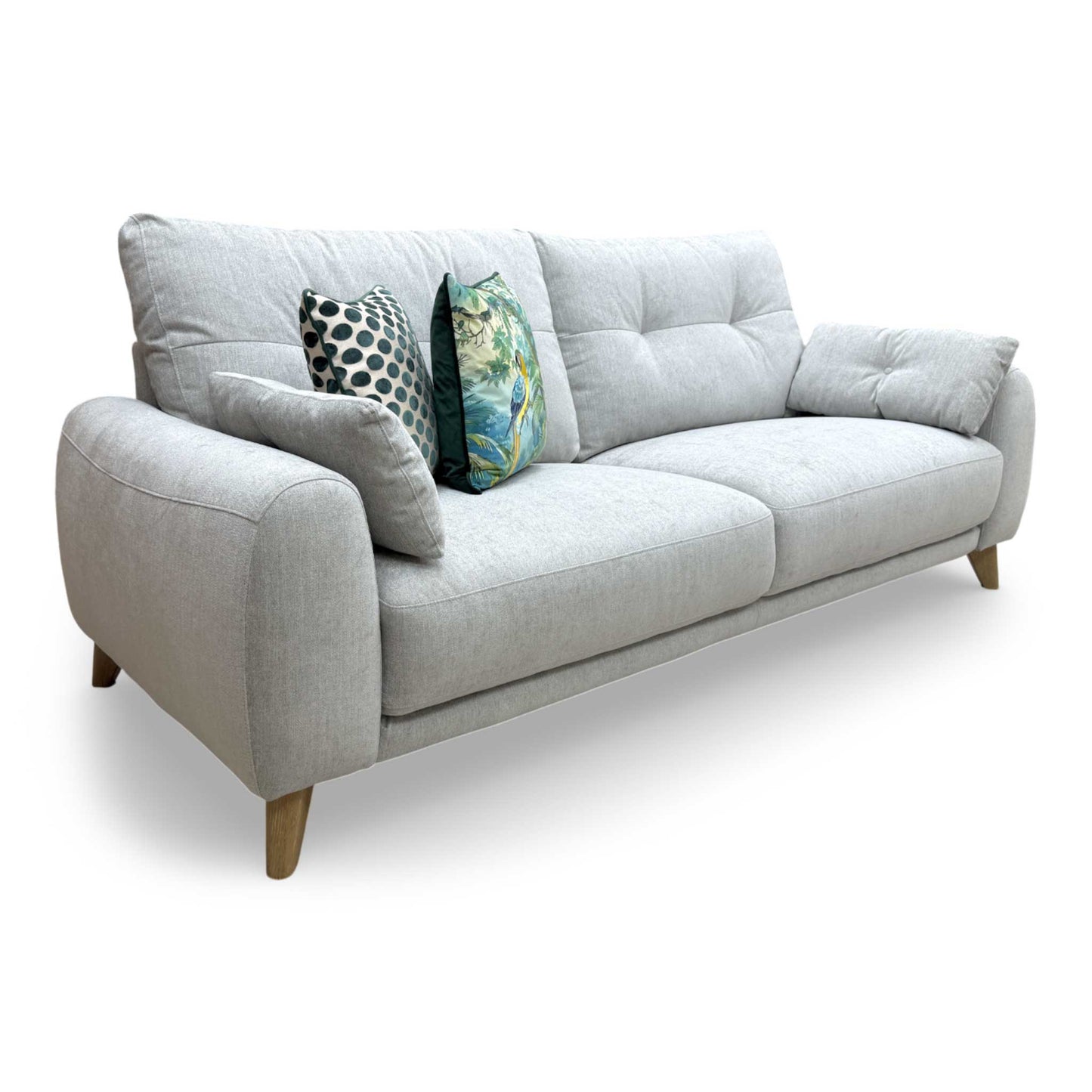Side view of the sofa, highlighting the clean profile and the inclusion of the arm bolsters.