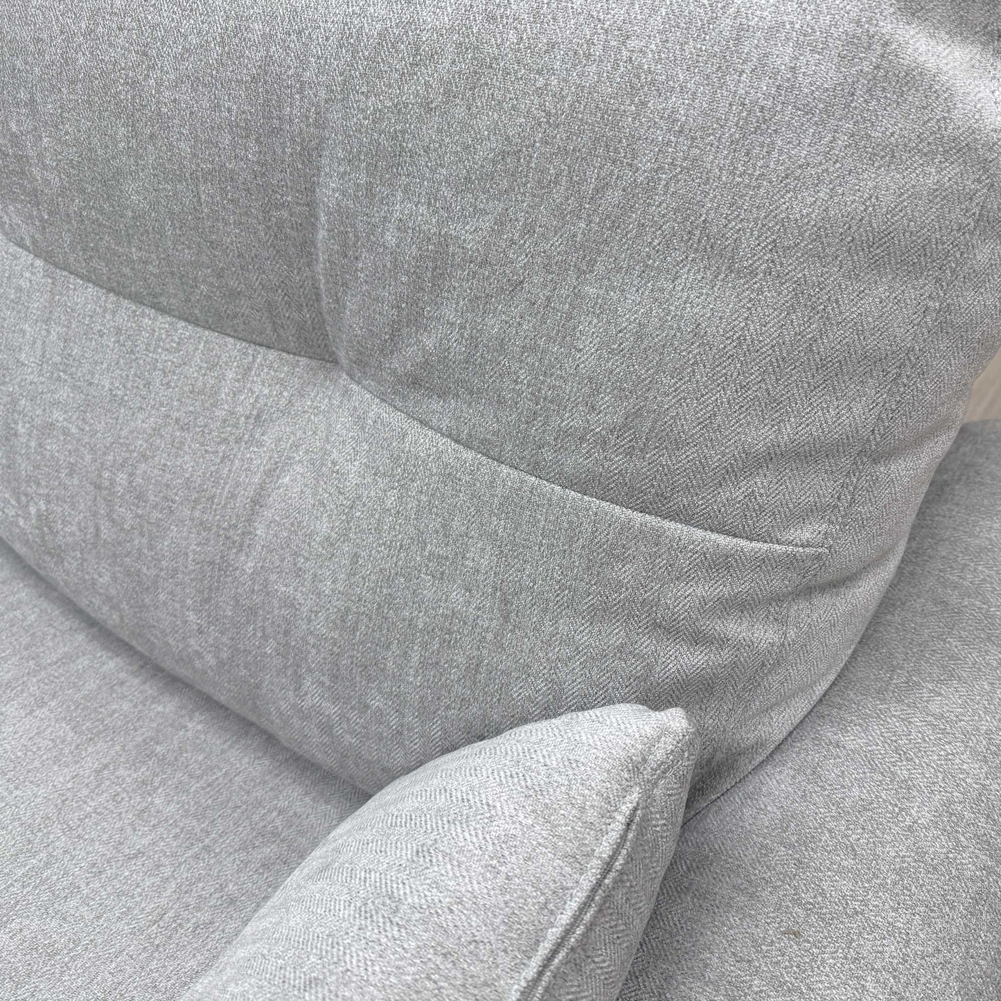 Close-up of the Haze Fab-Meo-R24 fabric texture and the subtle button detailing.