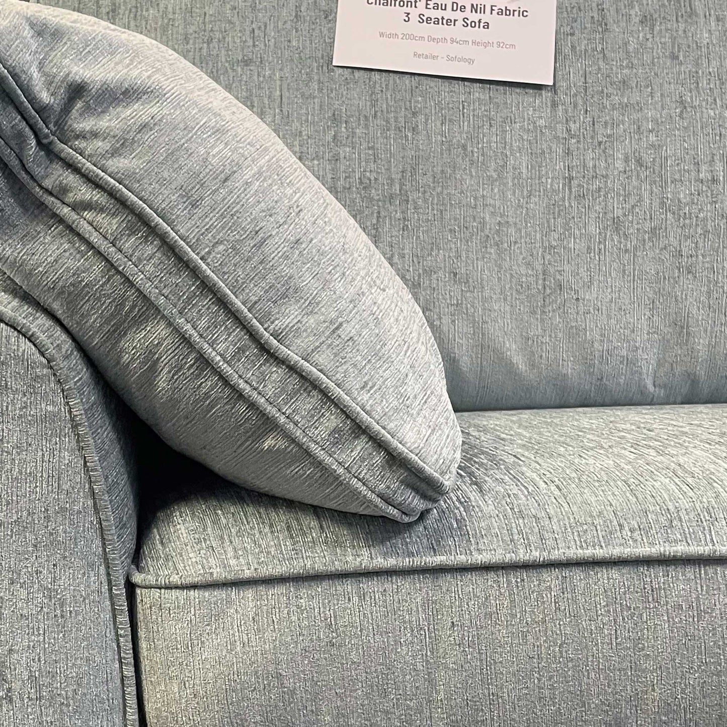 Close-up of the plush back cushions and Eau De Nil upholstery fabric on the Chalfont 3-seater.