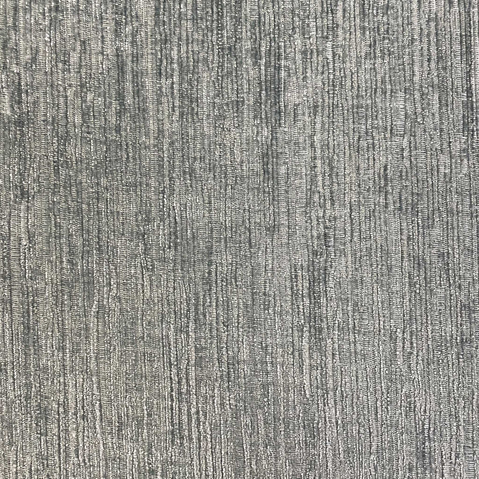 Detailed shot of the durable textured fabric and high-quality stitching of the sofa.