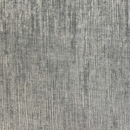 Detailed shot of the durable textured fabric and high-quality stitching of the sofa.