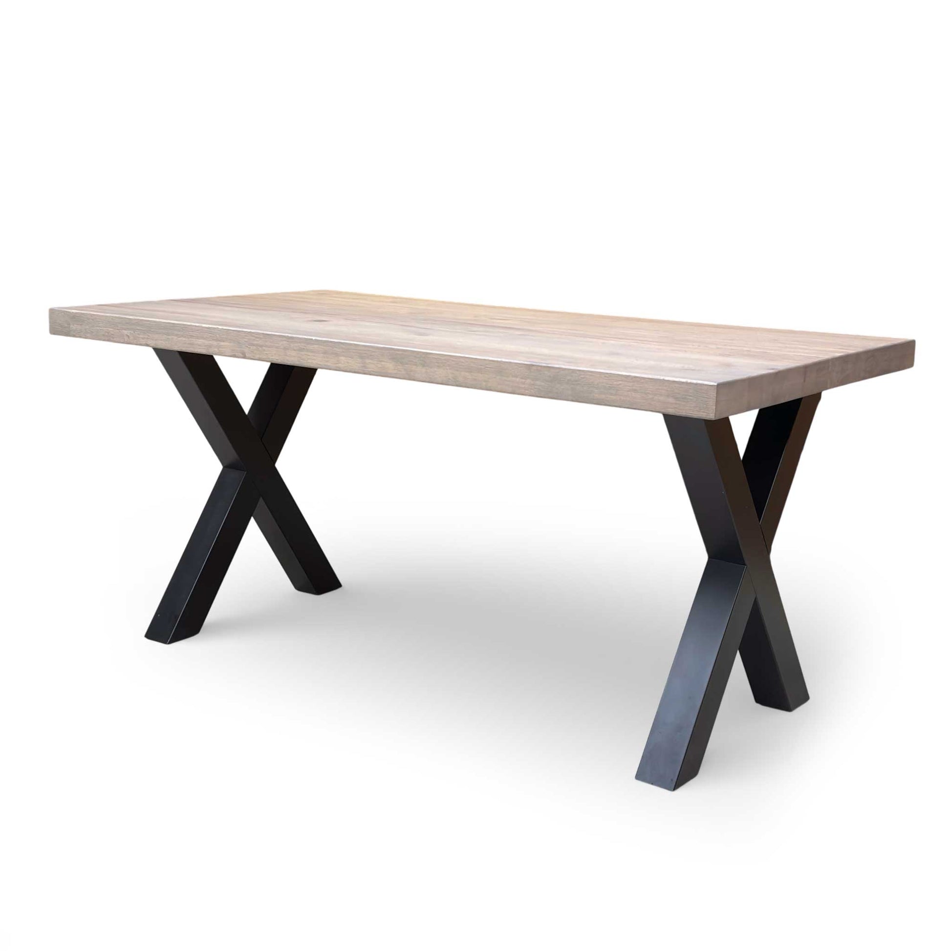 Side view of Bodahl Terra 8 vintage grey compact dining table with black metal X-shaped legs.