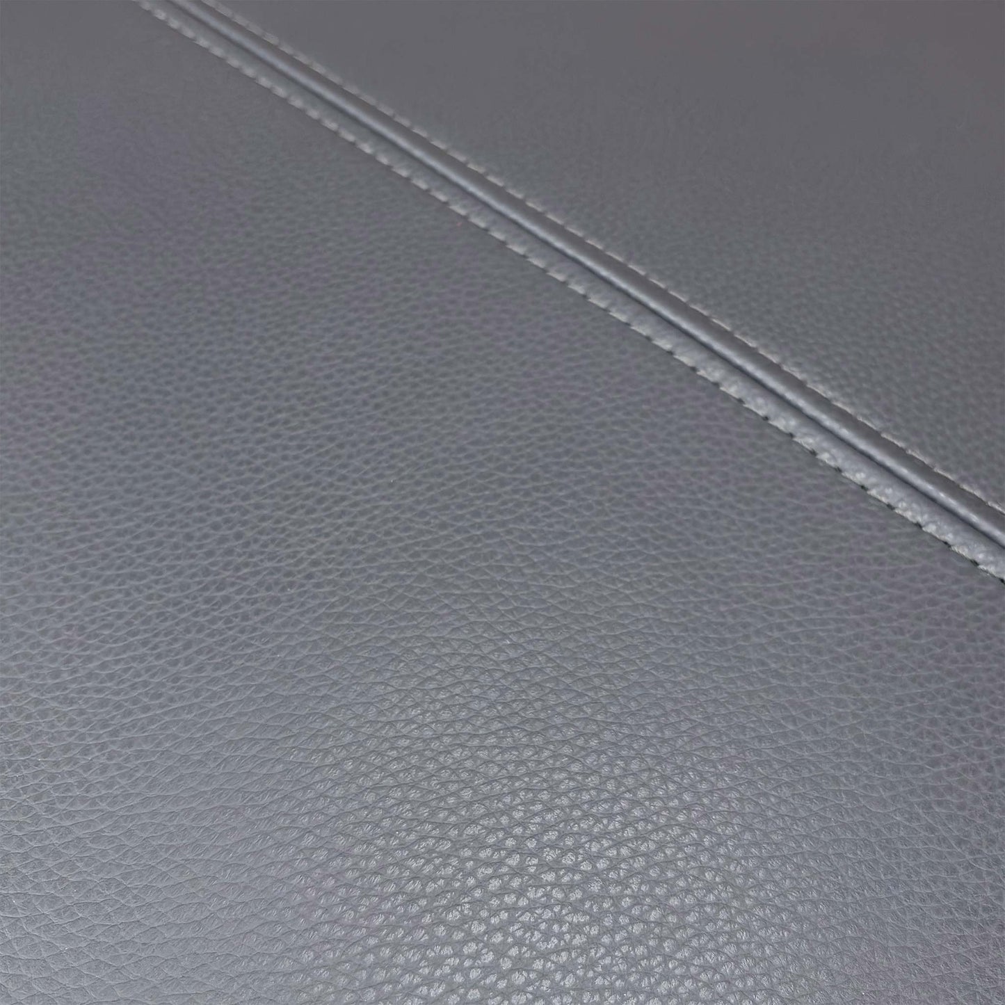 Close-up of the Cat 60 18 Lavender Grey leather, highlighting the premium grain, unique color tone, and expert stitching.