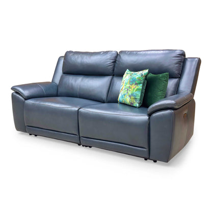 View of the "smile" stitching detail on the leather seats, designed to prevent puddling and maintain the sofa's shape.