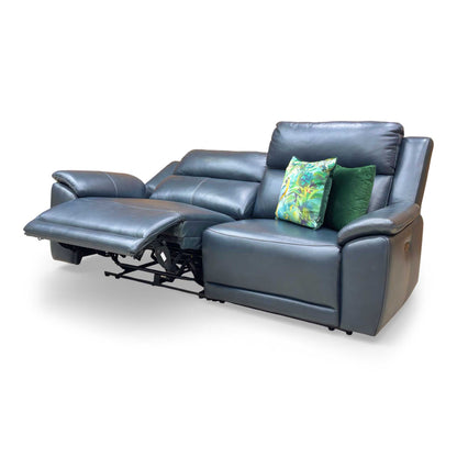 Detailed view of the sofa with one seat fully reclined, showcasing the integrated leg rest and ergonomic lounging angle.