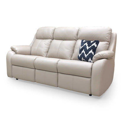 Side view of the Kingsbury sofa, highlighting the luxurious arm pads, deep cushioning, and hidden glide feet for a sleek look.