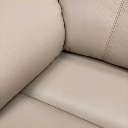 Detailed close-up of the Cambridge Plaster premium leather upholstery, emphasizing the fine grain and soft texture of the Grade L leather.