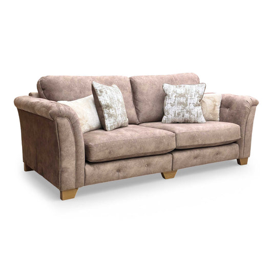 Side profile of the Aura 4 seater, emphasizing the deep seating comfort and sophisticated classic back design.