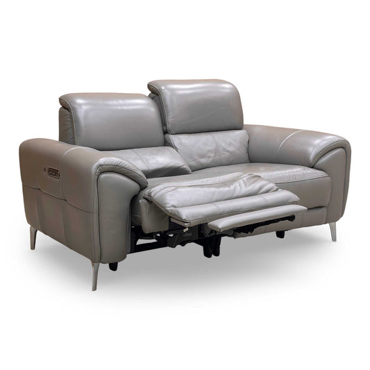 Front view of the Furniture Village ‘Vino’ 2 Seater Power Recliner Sofa in Elephant Leather Cat-40:15, featuring a sleek modern design and padded armrests.