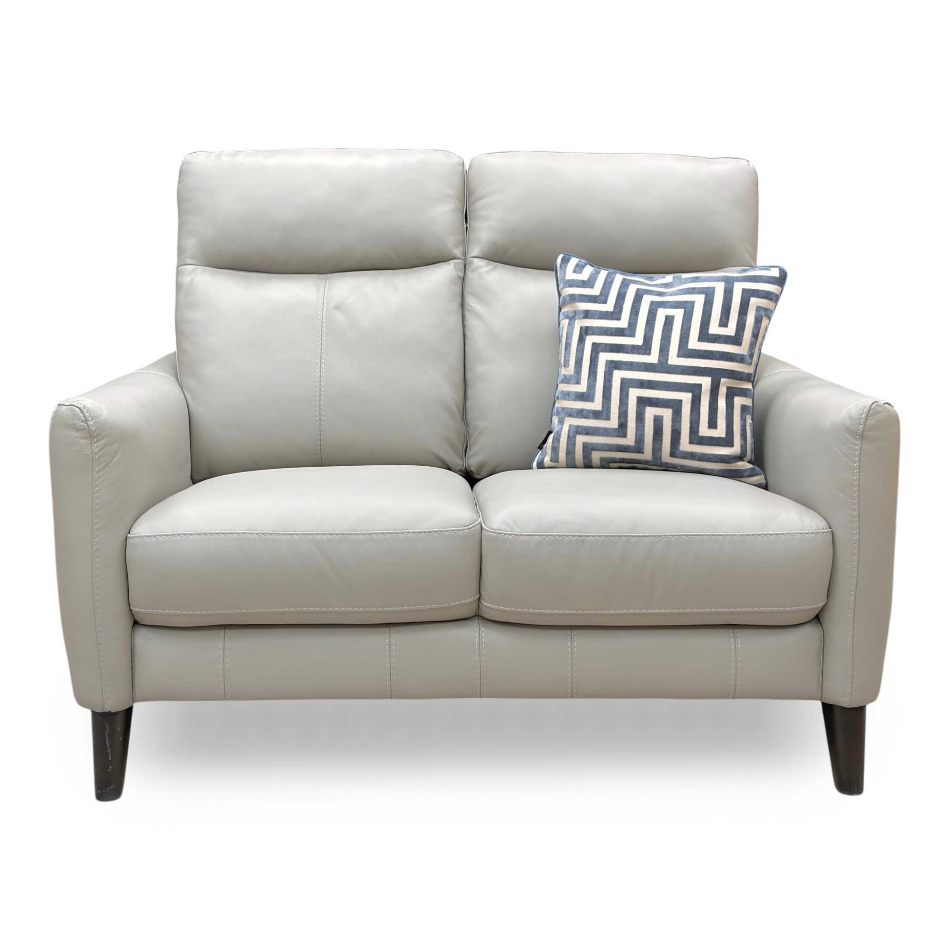 Front view of the feather grey leather sofa, highlighting the narrow arms and tapered wooden legs designed for smaller living spaces.