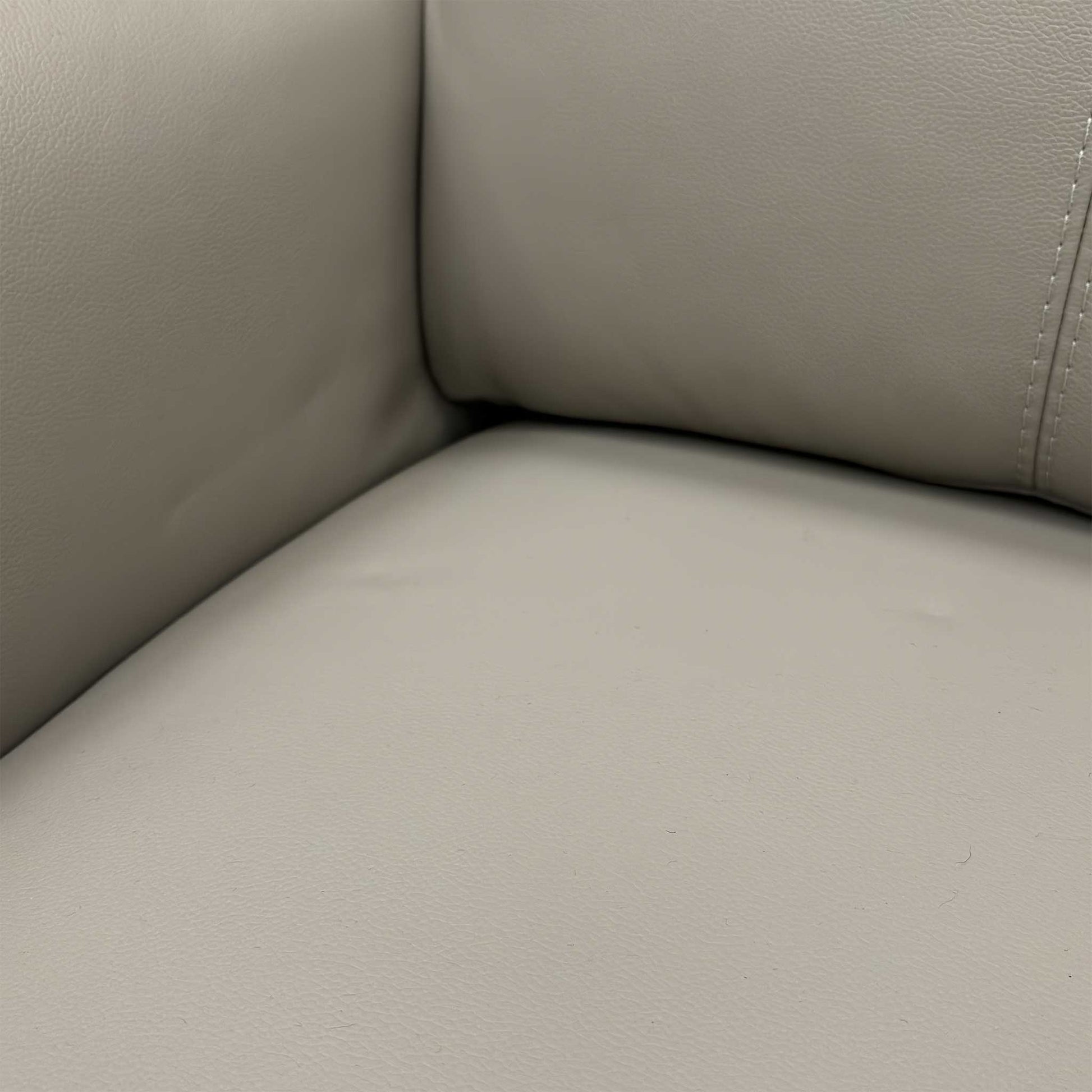 Detailed view of the seat and back cushions, highlighting the high-density foam interiors and quality stitching.