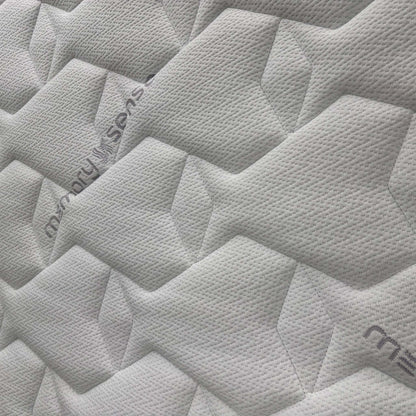 Close-up of the Sleepeezee branding and the "Memory Sense" label, signifying the Royal Warranted craftsmanship and premium quality materials.