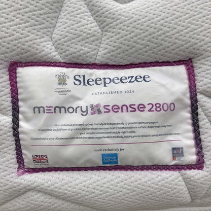 Detailed shot of the quilted mattress surface, highlighting the hypoallergenic fabric and the precision-stitched floral design.