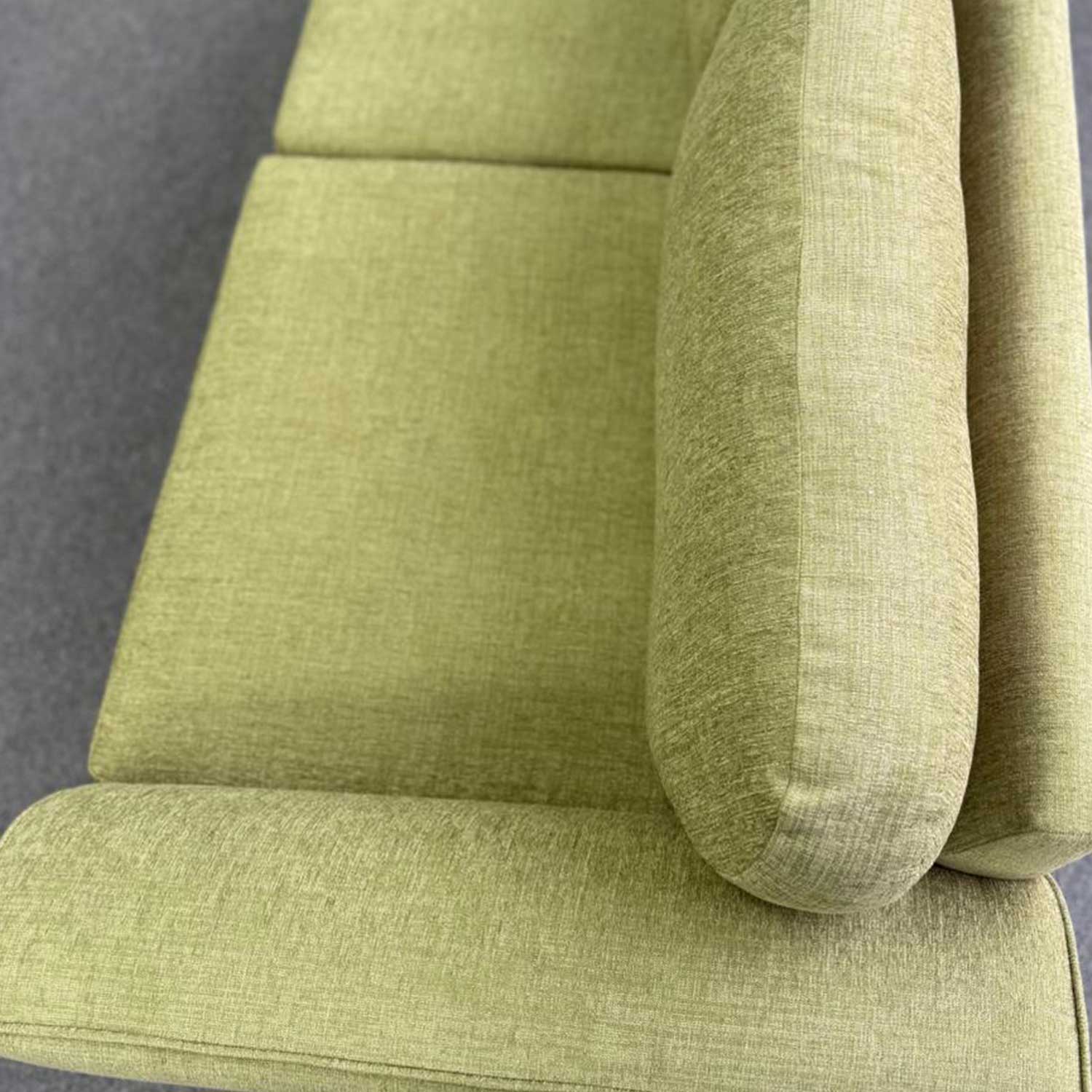 Detailed close-up of the lime green woven fabric, illustrating the durable texture and quality textile finish.