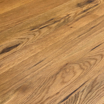 Detail close-up of the raw edge table top, highlighting the natural imperfections and high-quality oiled finish.