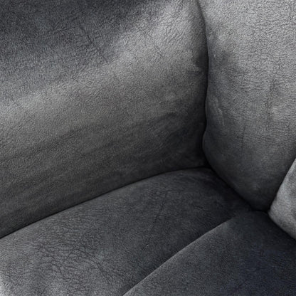 Detailed close-up of the luxurious liquorice charcoal velvet upholstery, showcasing the soft texture and premium fabric quality.