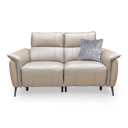 Front view of the Furniture Village ‘Jude’ 2 Seater Power Recliner Sofa in Oslo Oyster leather, featuring a relaxed contemporary style.