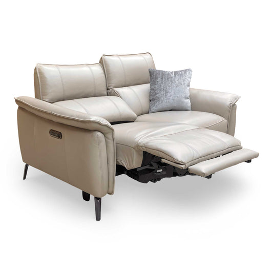 Front view of the Furniture Village ‘Jude’ 2 Seater Power Recliner Sofa in Oslo Oyster leather, featuring a relaxed contemporary style.