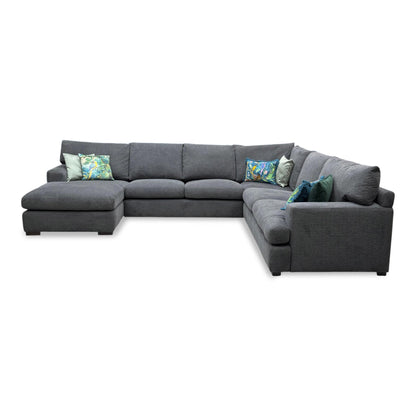 Front view of the charcoal fabric sofa, highlighting the wide seating area, plush cushions, and contemporary silhouette.
