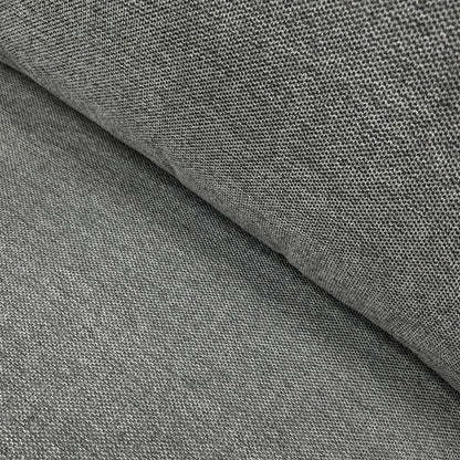 Close-up of the textured charcoal fabric upholstery, showcasing the high-quality finish and durable weave.