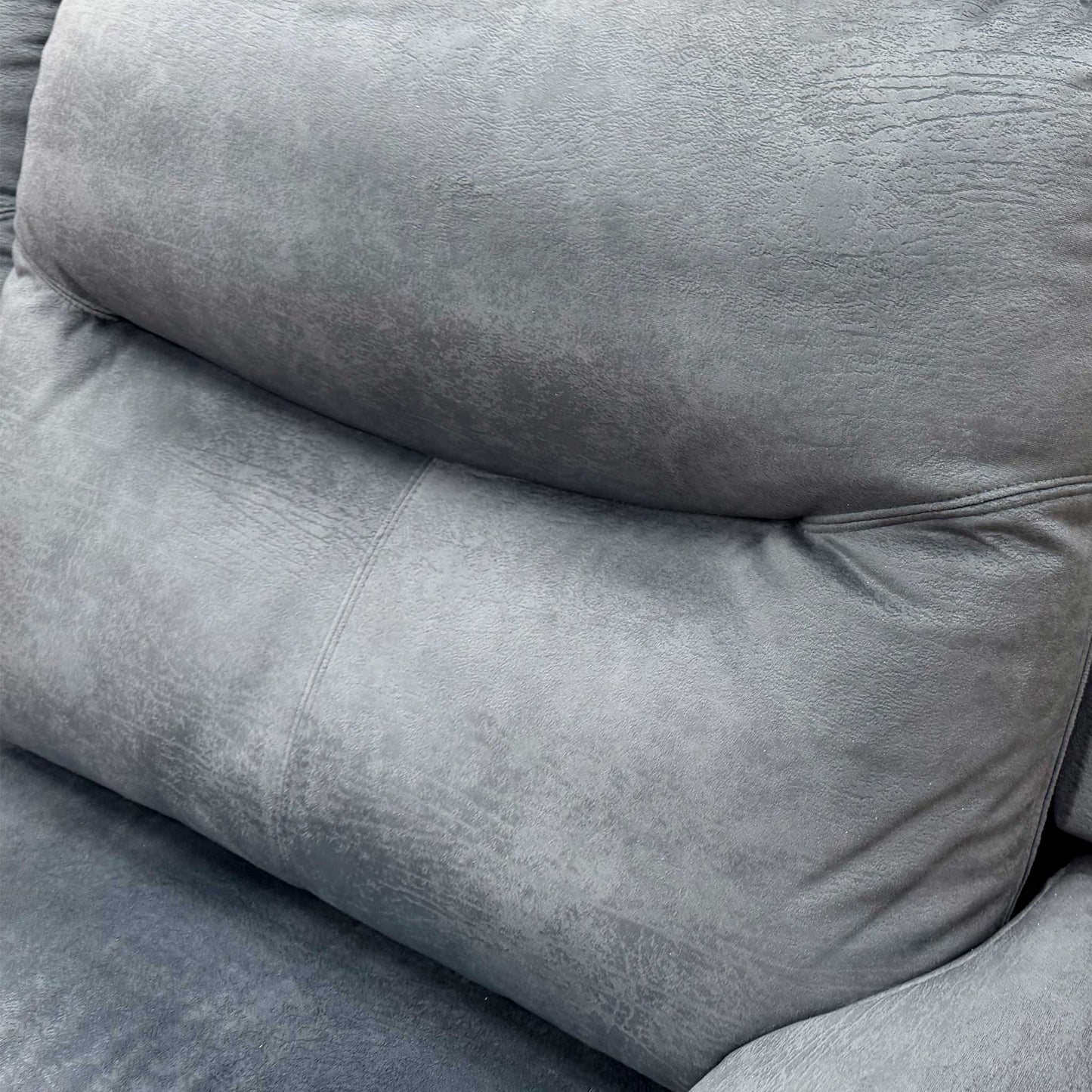 Close-up of the luxurious Midnight Blue velvet fabric texture on the G Plan sofa.