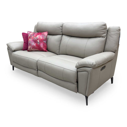 Focus on the industrial-style metal legs and open-base design of the Panache sofa.