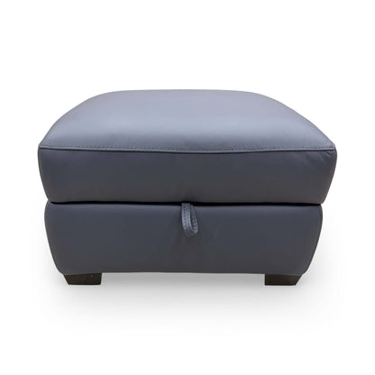Front view of the ocean blue leather footstool, emphasizing the quality of the premium leather upholstery.