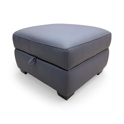 Front view of the World of Leather 'Cozee' storage footstool in ocean blue premium leather.