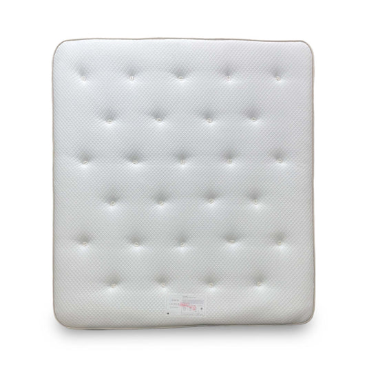 Full view of the John Lewis Ortho mattress, emphasizing its clean, white orthopaedic design and robust edge support.
