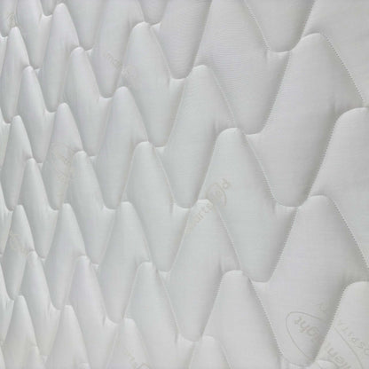 Detailed close-up of the mattress surface, showing the high-quality stitching and breathable cover designed for commercial use.