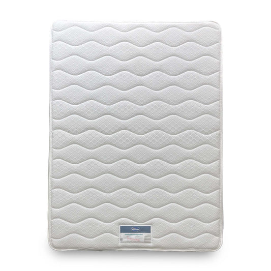 Full view of the King mattress, highlighting the defined pillow-top layer and sturdy border construction.