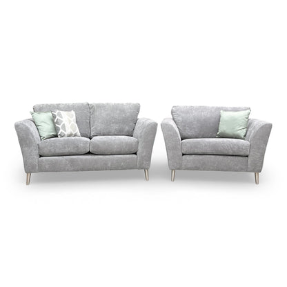 Detailed side profile of the Lana grey sofa, emphasizing the clean lines and sophisticated contemporary aesthetic.