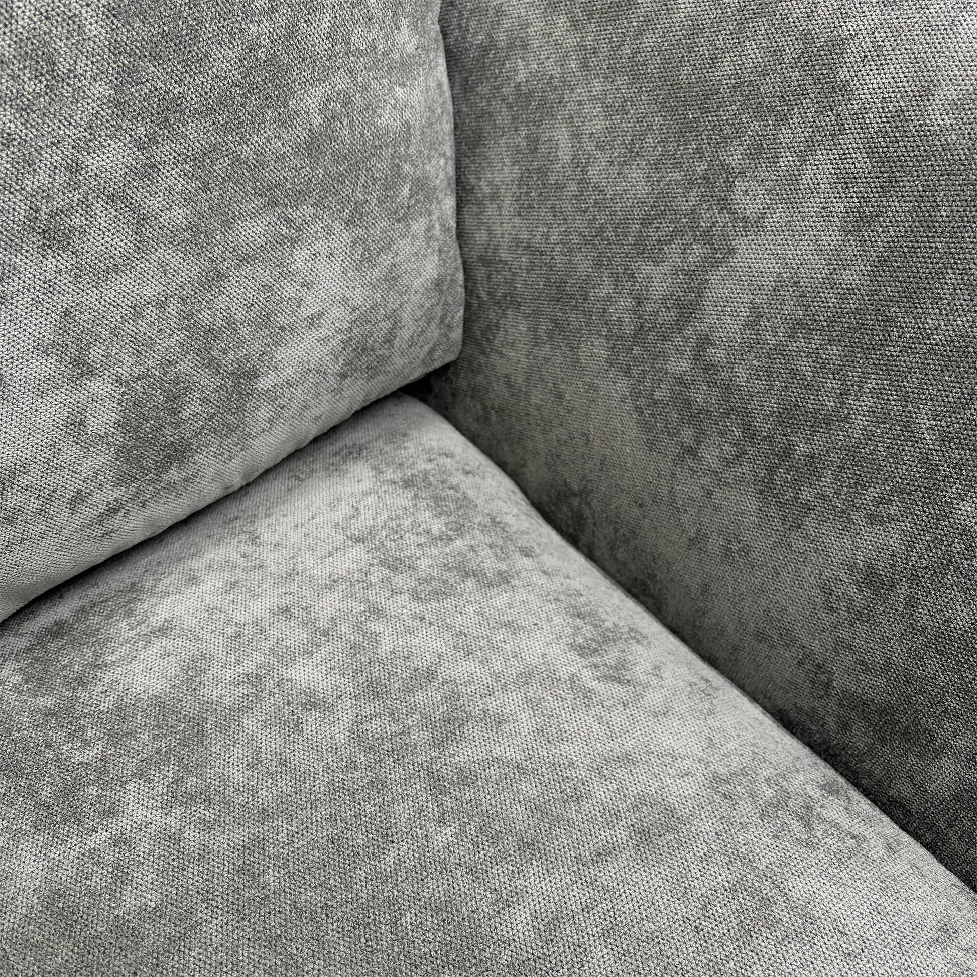 Close-up of the Kingston grey fabric on the Lana sofa set, illustrating the durable material and quality stitching.