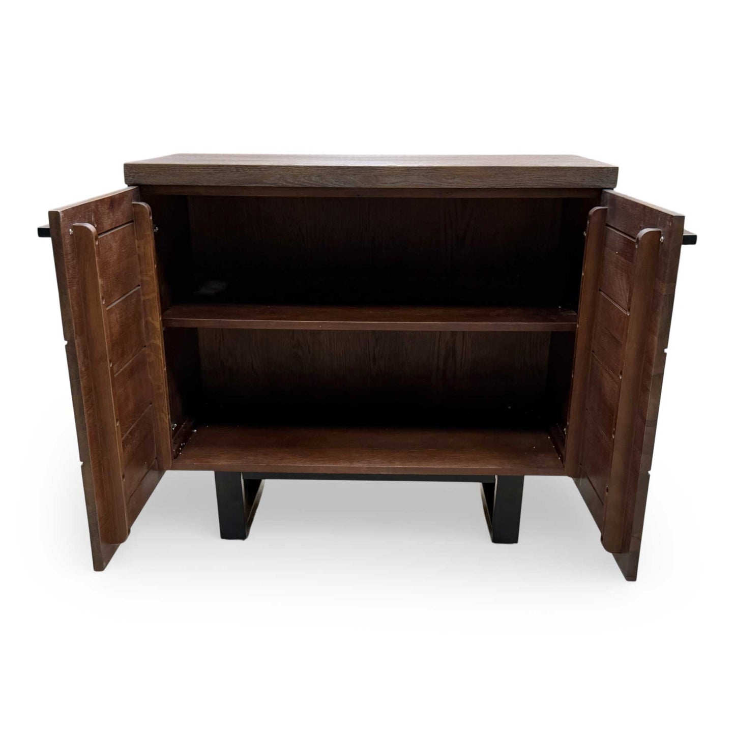 View of the sideboard’s base and legs, highlighting the robust support and elegant traditional design elements.