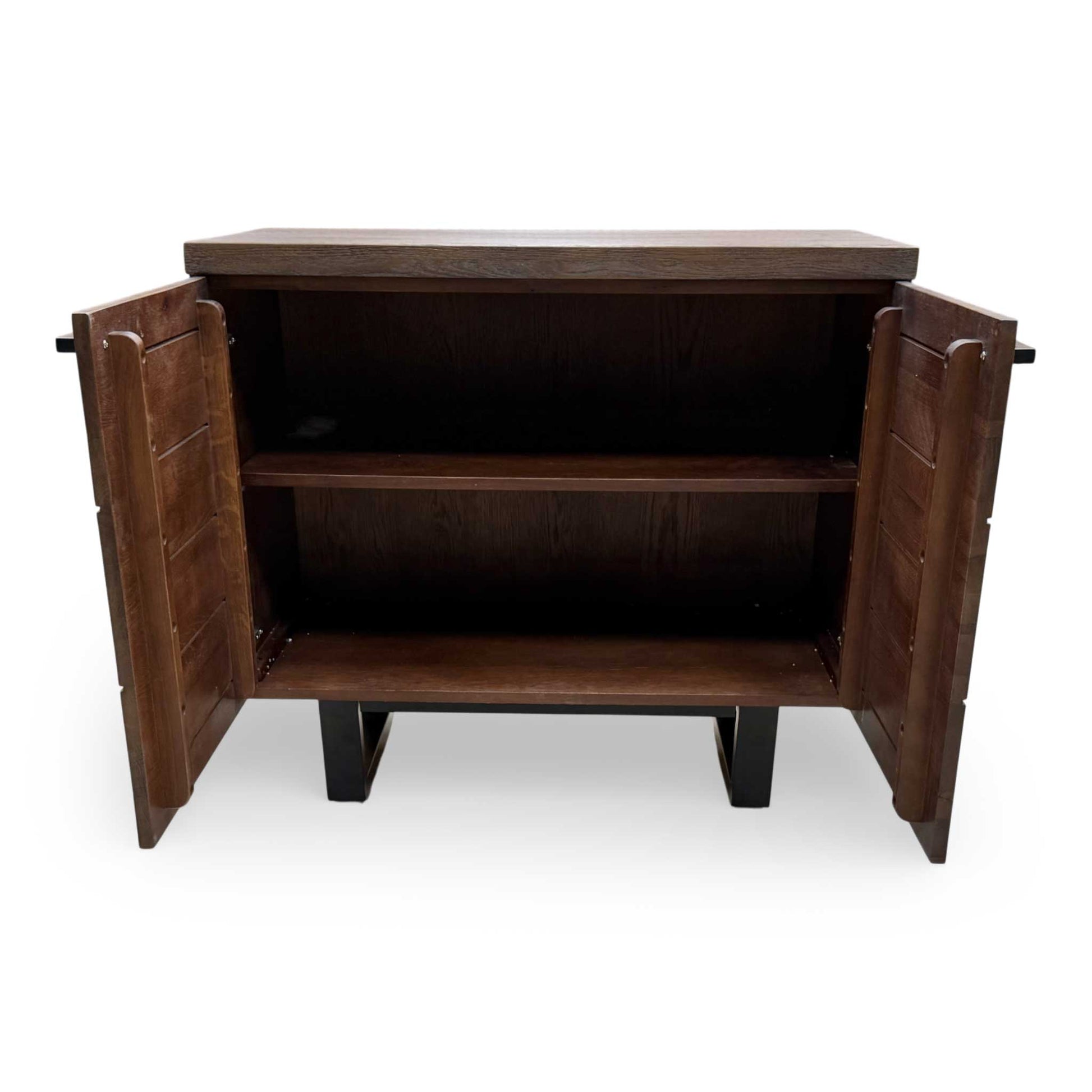 View of the sideboard’s base and legs, highlighting the robust support and elegant traditional design elements.