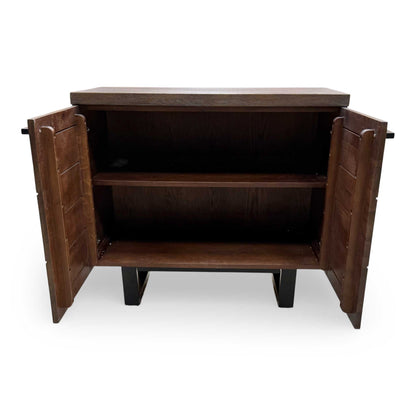 View of the sideboard’s base and legs, highlighting the robust support and elegant traditional design elements.