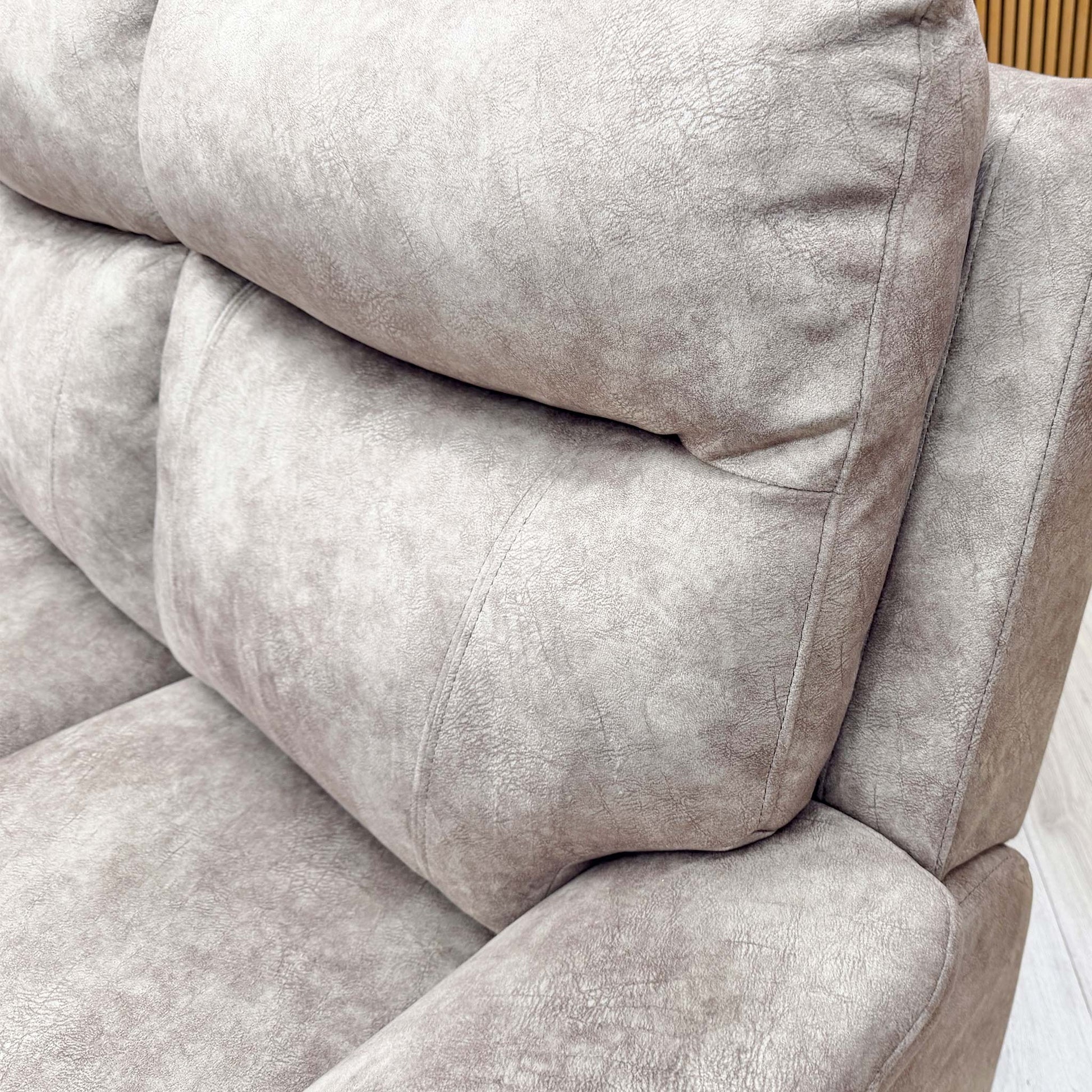 Close-up of the sofa's corner section, illustrating the high-quality stitching and seamless integration of the modular units.