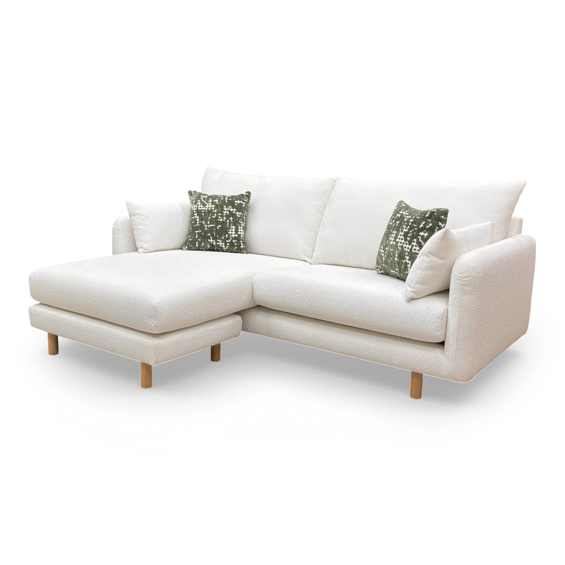 Three-quarter view of the Aero sofa, highlighting the textured boucle fabric and deep-seated comfort.