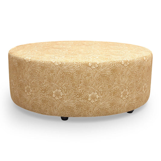 Full view of ‘Iris’ round footstool upholstered in vibrant yellow velvet with a beautiful botanical floral pattern