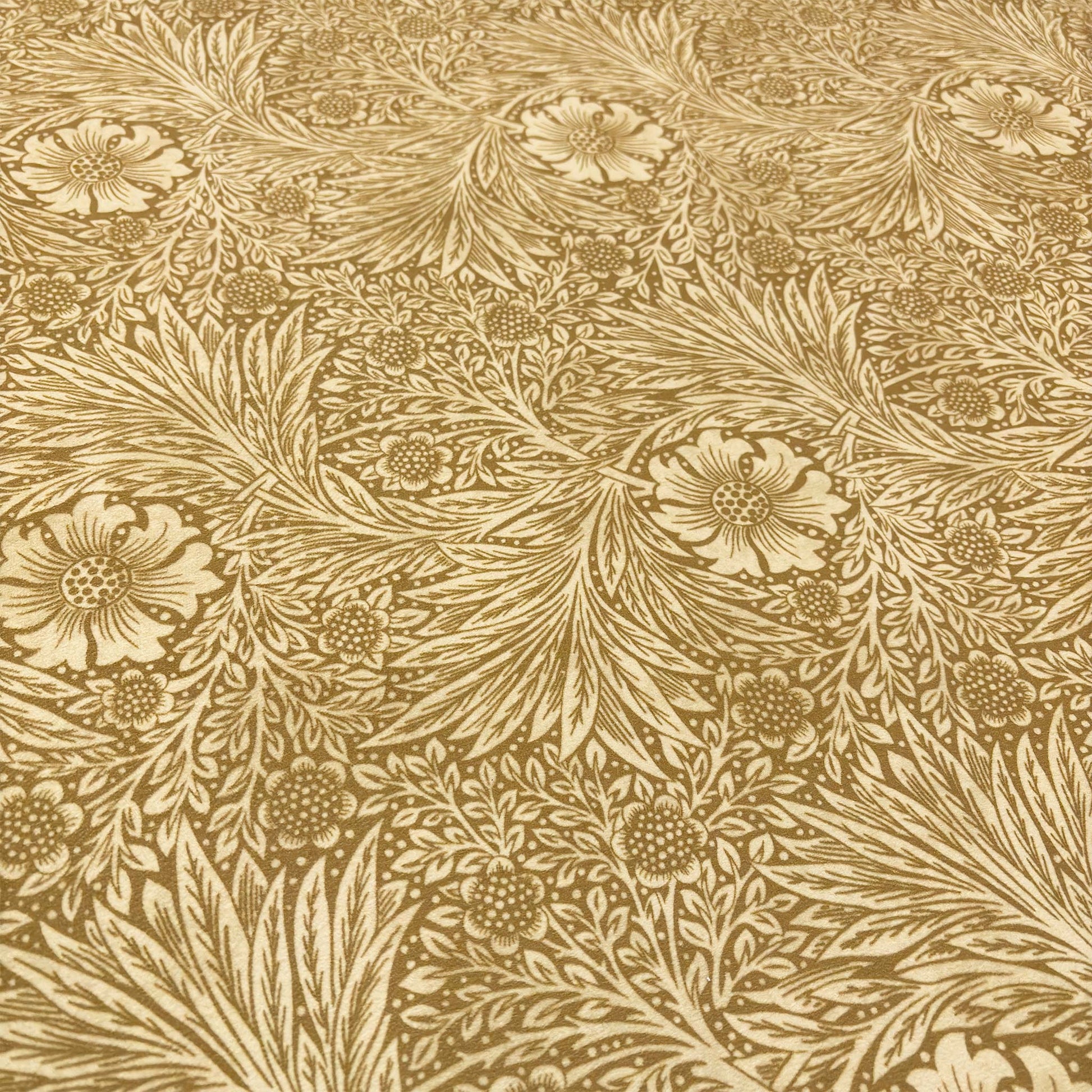 Close-up of the yellow velvet fabric, detailing the intricate floral pattern with soft leaves and botanical motifs.