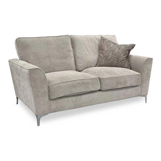 Full view of the Legend 2-seater sofa in Kingston Silver fabric, featuring a classic back design with plush cushions and elegant dark wood feet.